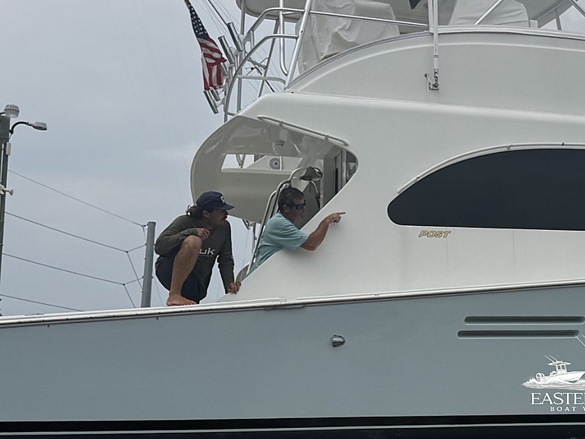 Outriggers and antennas on a sportfishing boat, installed with clearance in mind