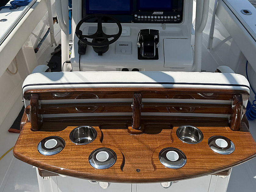 A Release Marine teak rocket launcher in the cockpit of a sportfishing boat