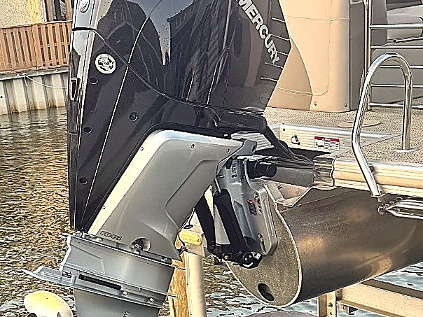 The new Mercury outboard fitted to the transom after the repower