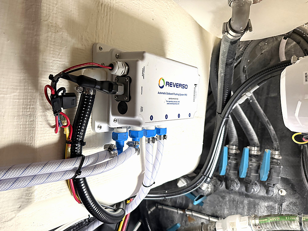 A Reverso flushing unit installed and plumbed on a second boat