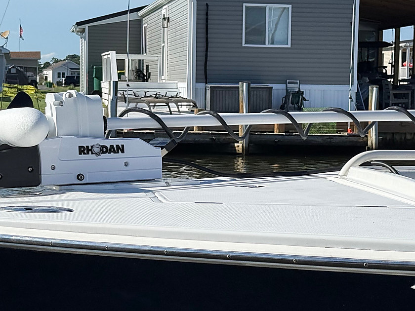 A Rhodan trolling motor installed on a Jupiter at the owner's dock